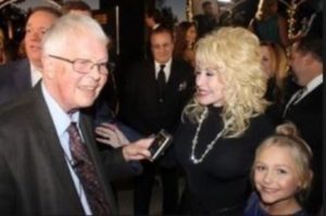 Dan Wooding with Dolly Parton at Movieguide awards