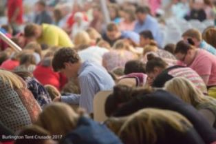 Prayer in the big tent