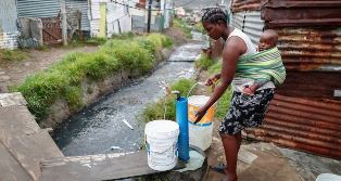 South African woman gets water smaller
