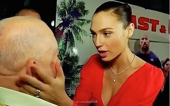 mi Gal Gadot touches the face of her late grandfather Holocaust survivor Abraham Weiss 04 14 2018